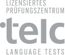 „telc-Logo mit dem Zusatz ‚Lizenzierter Prüfungszentrum‘ und ‚Language Tests‘ in grauer Schrift auf weißem Hintergrund.“
